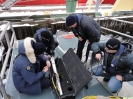 RCMP Underwater Recovery Team Members learning to set up the towfish