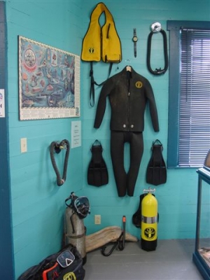 A complete set of US Divers scuba equipment from the 1960's on display in the St. Paul Island, Shipwrecks and Treasure Museum