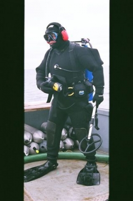 Terry Dwyer with his Aqua Scan Underwater Metal Detector preparing to dive off St. Paul Island.