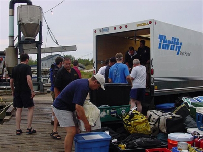 Yet another expedition arrives from the U.K. and unloads at Aspy Bay Fisheries wharf.