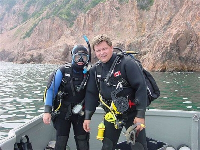 The Wreck Huntress (Suzie Dwyer) and the Wreck Hunter prepare for a dive off St. Paul Island.
