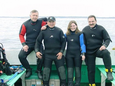 Doug Carmichael, Terry Dwyer, Suzie Dwyer and Gabe Carrier after a dive on the PORTIA in Sambro, Nova Scotia